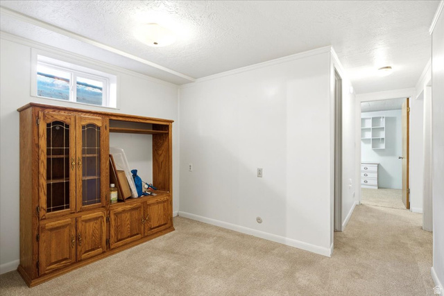 272 East 1400th Street North Bountiful, UT 84010 - Photo 24 of 38 Little Den area at the bottom of the stairs to the left. The entry to the basement family room is to the right.