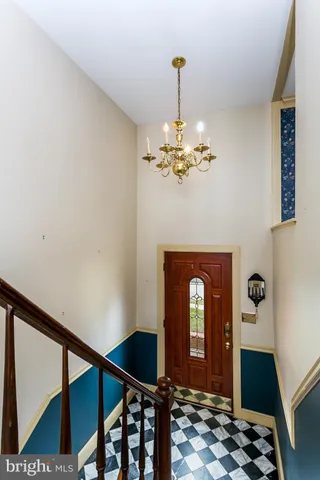 a front view of a room with a chandelier