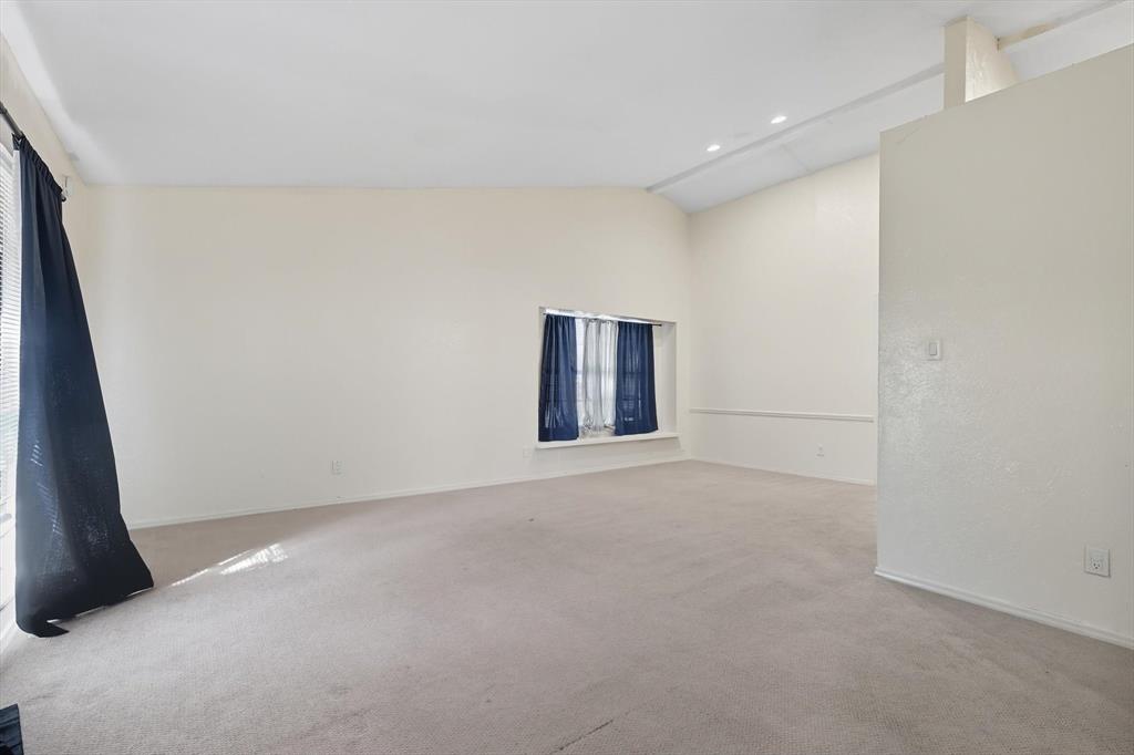 9101 Denver Street Rowlett, TX 75088 - Photo 7 of 40 an empty room with windows
