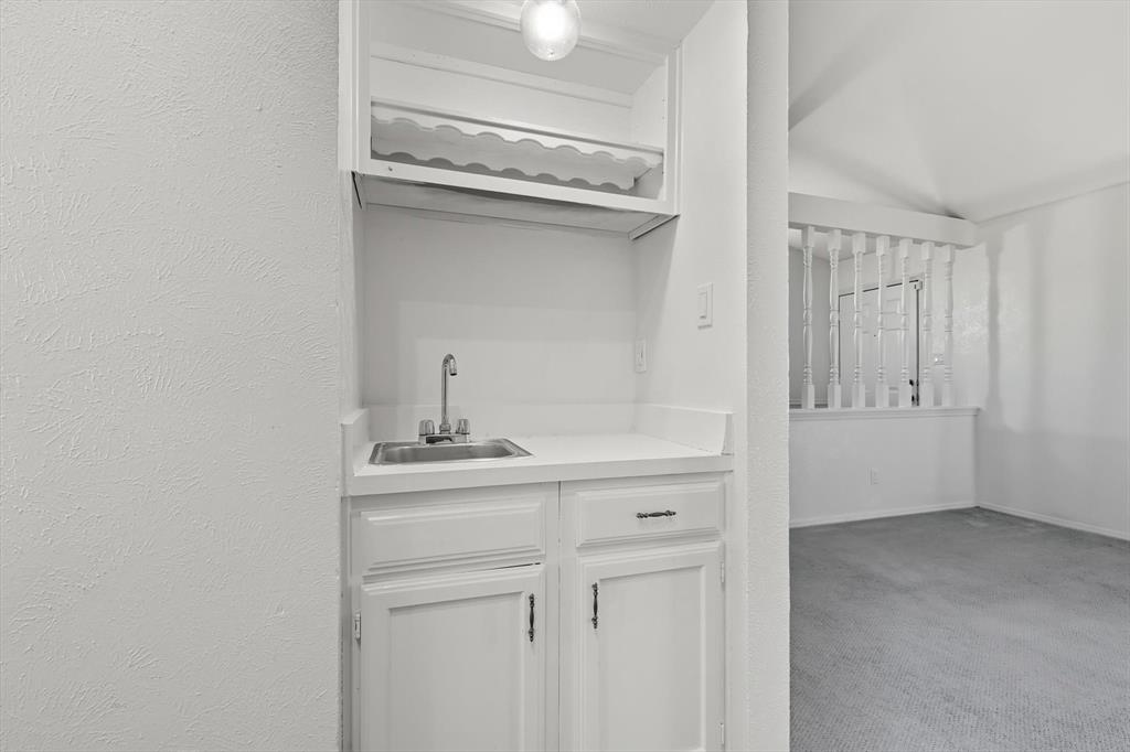 9101 Denver Street Rowlett, TX 75088 - Photo 9 of 40 a view of cabinets