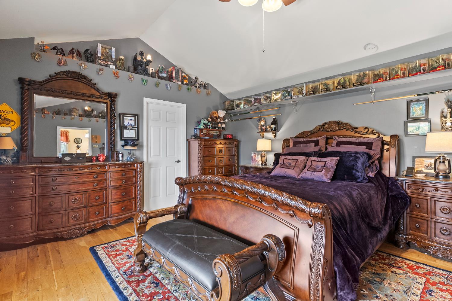 750 Looner Den Road Appomattox, VA 24522 - Photo 27 of 91 a bedroom with a bed a dresser and potted plants on the dresser