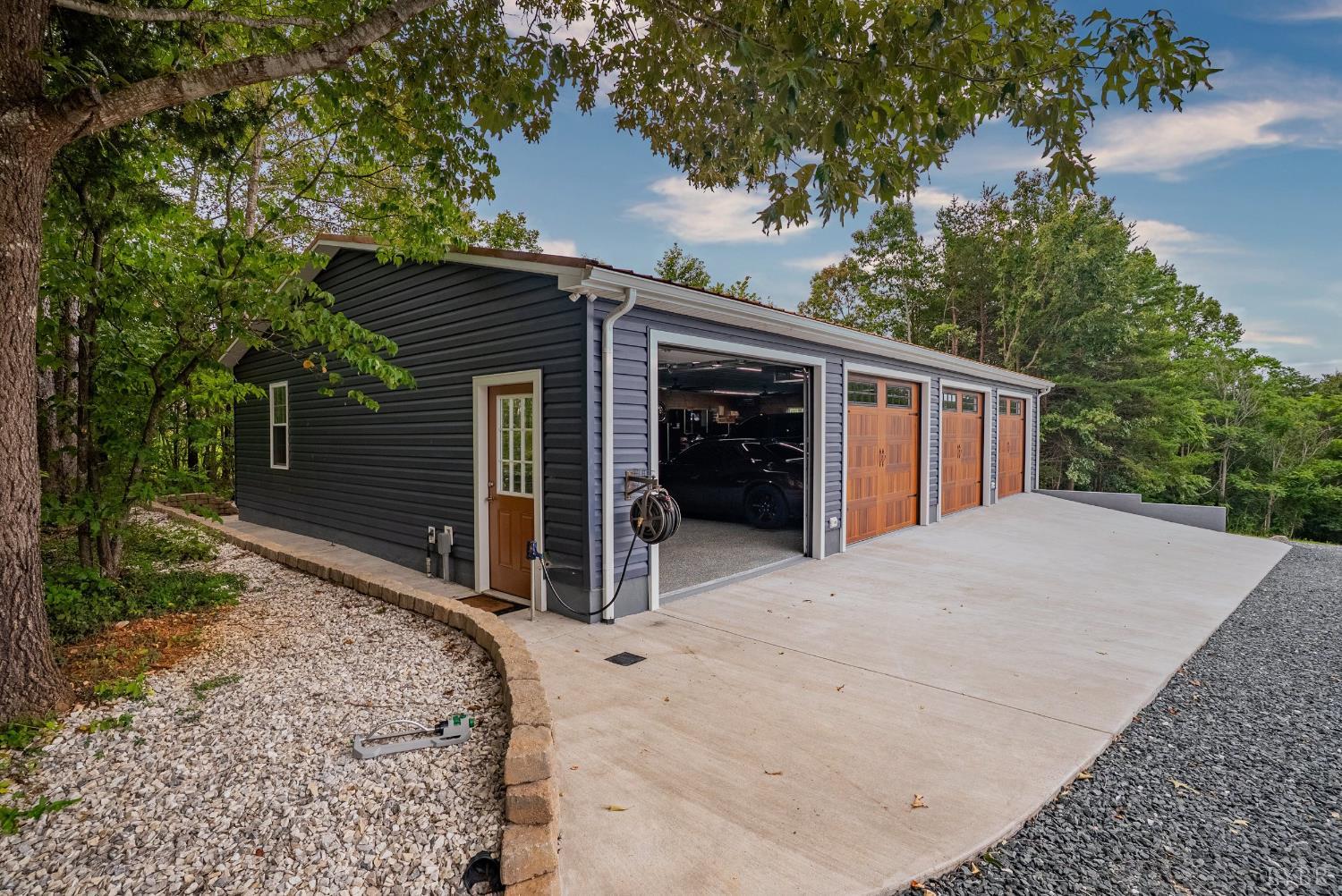 750 Looner Den Road Appomattox, VA 24522 - Photo 46 of 91 a view of a house with a backyard