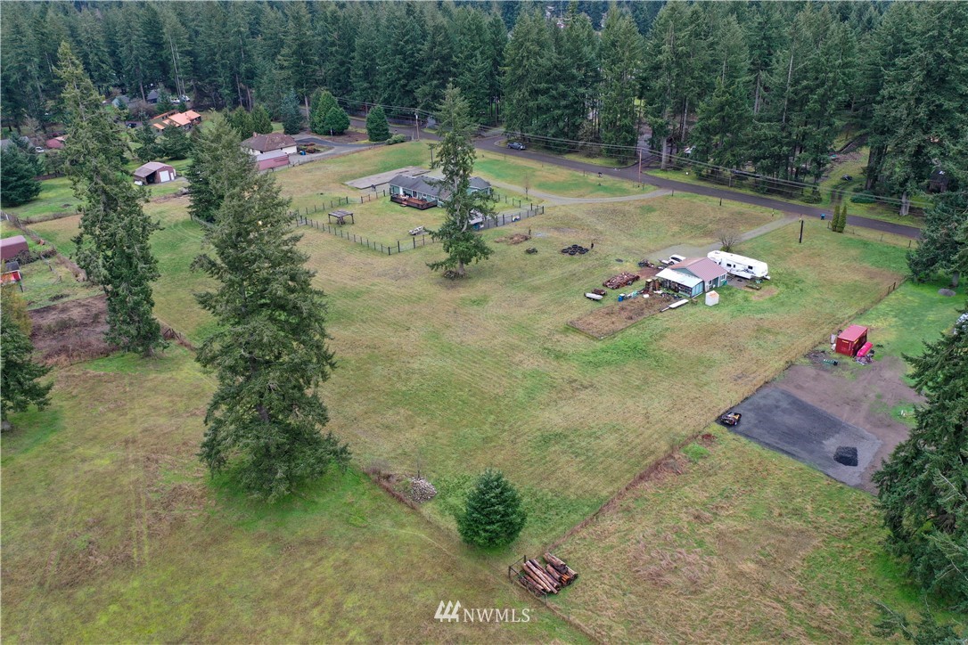 8306 173rd Avenue Southwest Rochester, WA 98579 - Photo 39 of 40 a view of a tree with a yard