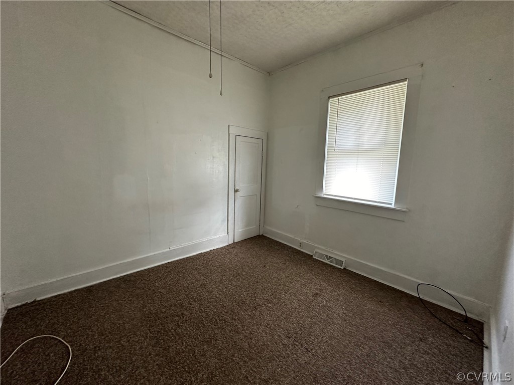 2007 West City Point Road Hopewell, VA 23860 - Photo 6 of 9 an empty room with a window
