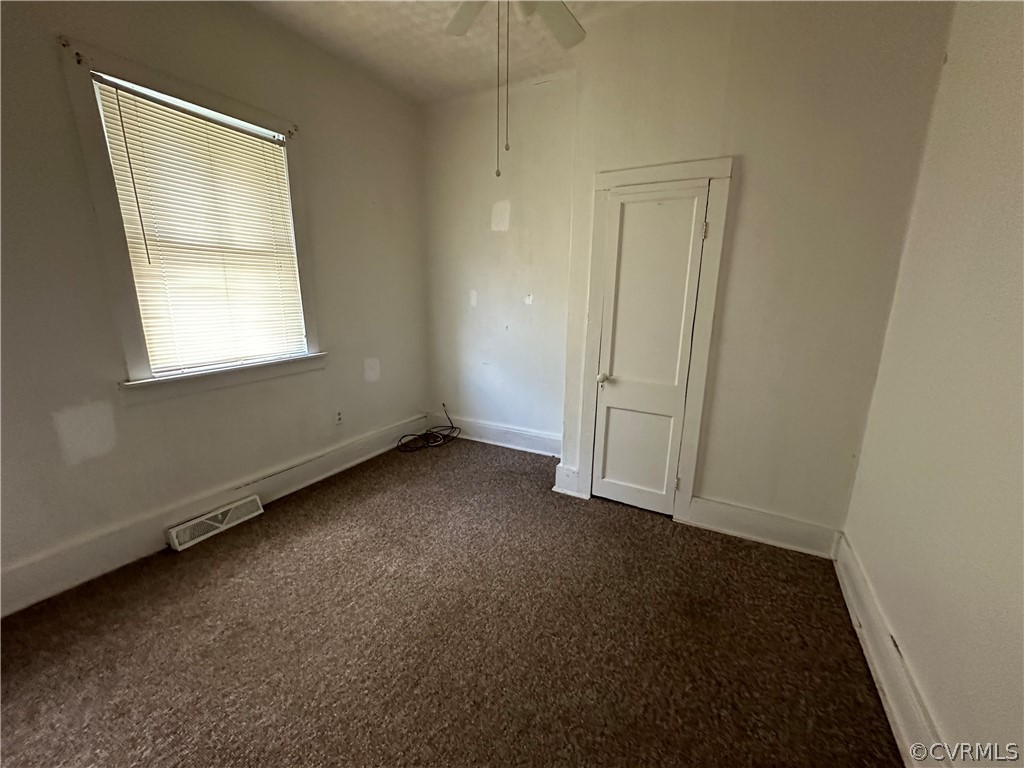 2007 West City Point Road Hopewell, VA 23860 - Photo 7 of 9 an empty room with a window