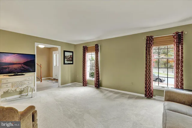a view of livingroom with furniture and window