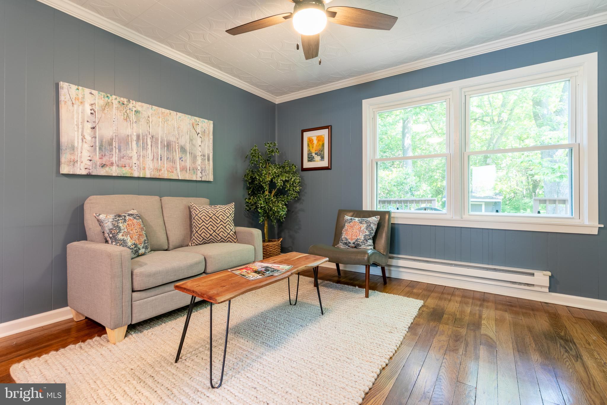 62 F Ridge Road Greenbelt, MD 20770 - Photo 5 of 22 a living room with furniture and a window