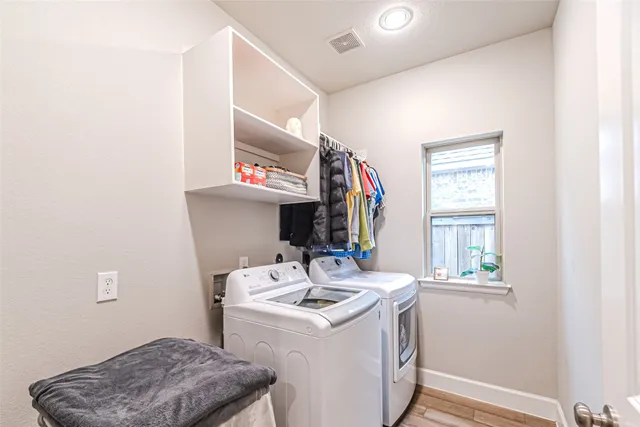 a utility room with dryer and washer