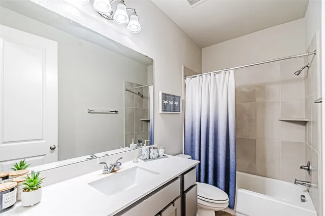 a view of a storage and utility room with a window