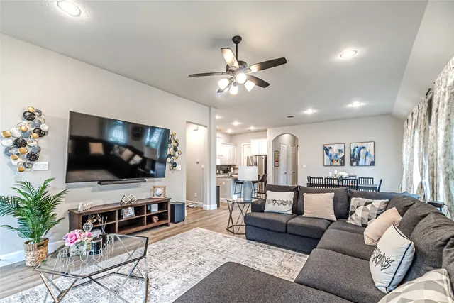 a bedroom with a bed and a couch