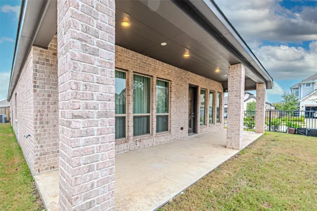 a view of a house with a garden