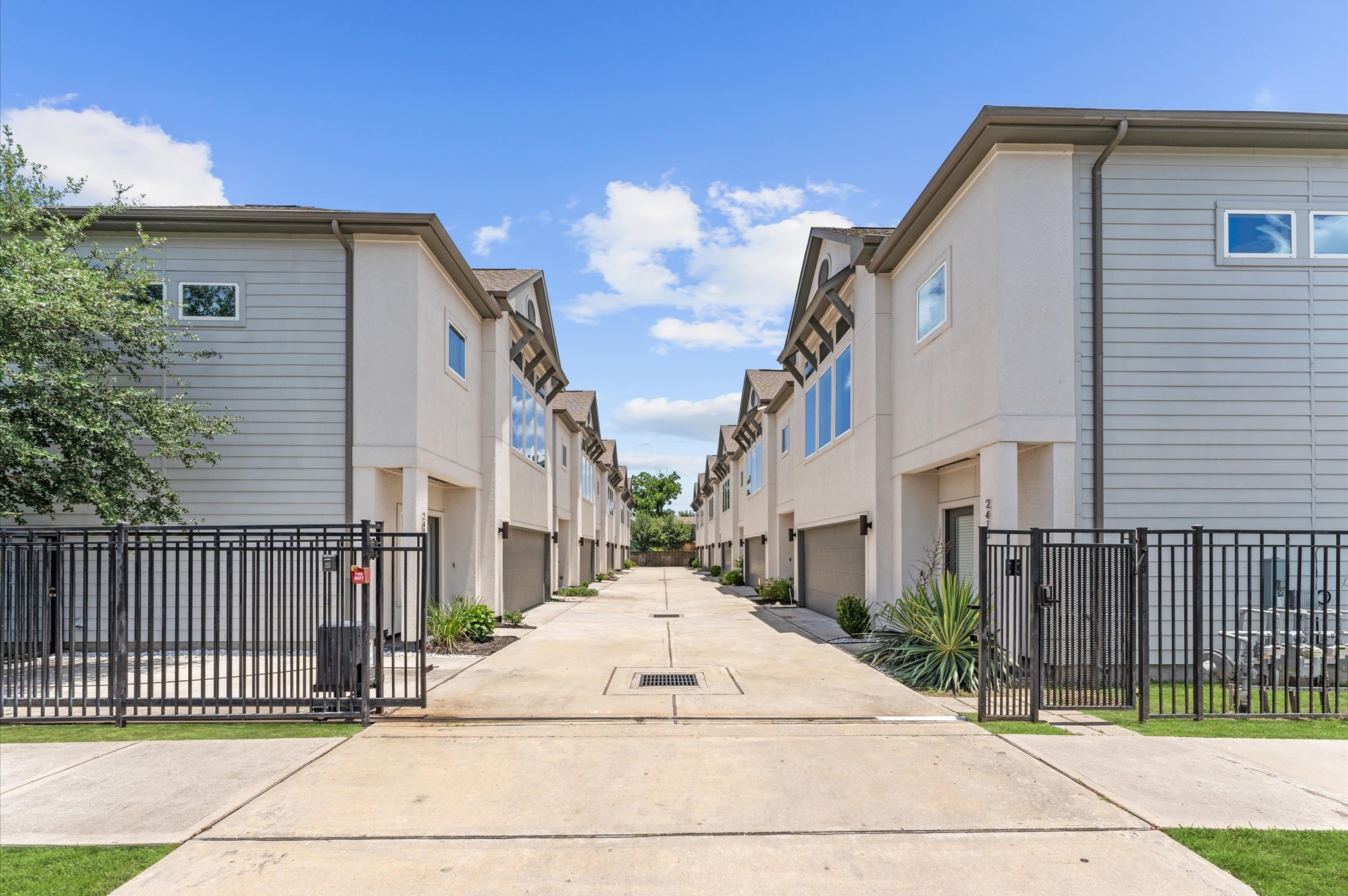 2422 Cochran Street Houston, TX 77009 - Photo 6 of 31 A gated community offers extra peace of mind to know the only people driving in the area are permitted to be there.