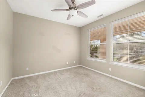 a bedroom with a bed and a closet