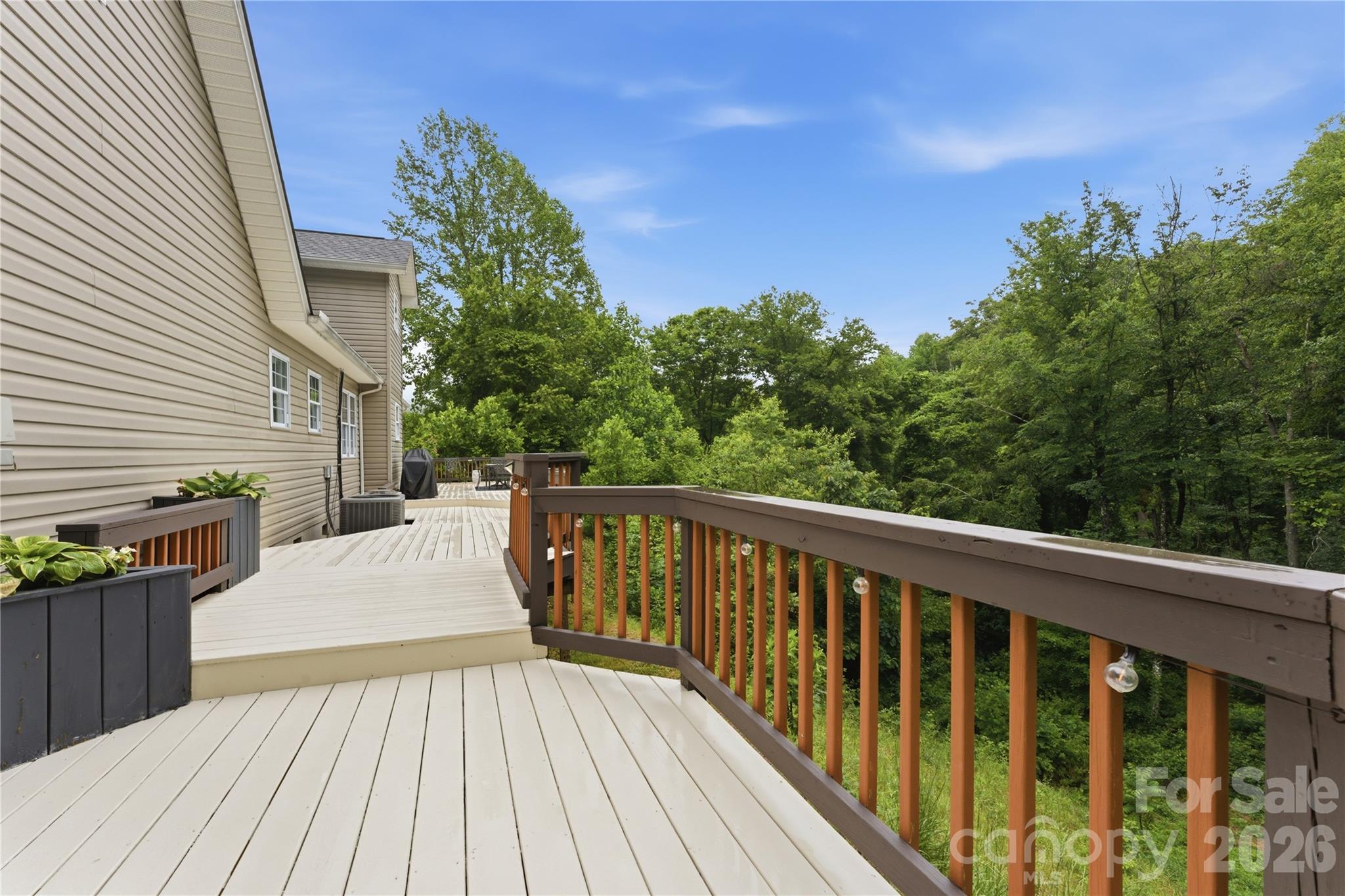 15 Raccoon Point Canton, NC 28716 - Photo 35 of 48 a balcony with wooden floor and fence