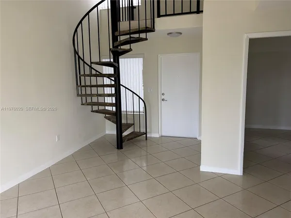 a view of an empty room with window