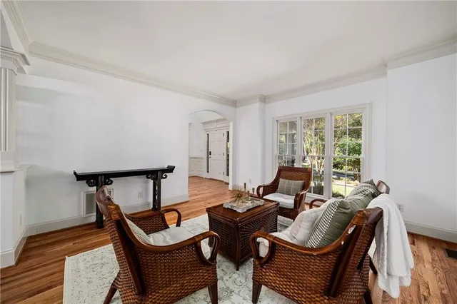 a workspace with furniture window and wooden floor