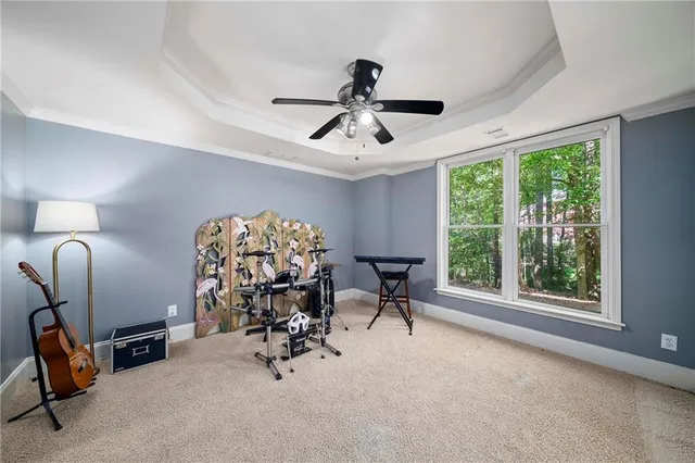 a front view of house with yard and outdoor seating