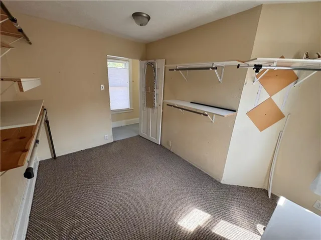 a view of a storage & utility room with washer and dryer