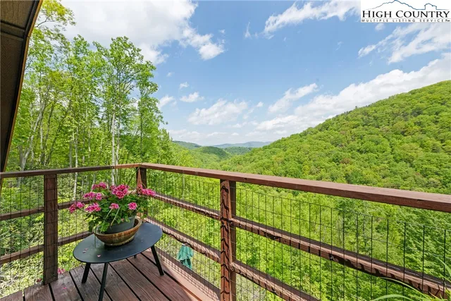 a view of a couple of people sitting in the roof