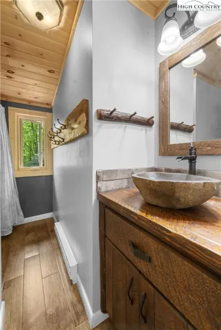 a view of a living room and kitchen