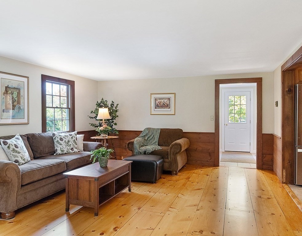 830 Liberty Square Road Boxborough, MA 01719 - Photo 11 of 40 a living room with furniture and a couch