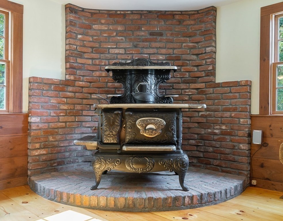 830 Liberty Square Road Boxborough, MA 01719 - Photo 13 of 40 a stove top oven sitting inside of a kitchen