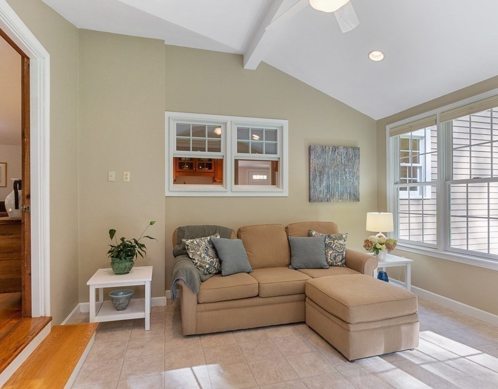 830 Liberty Square Road Boxborough, MA 01719 - Photo 15 of 40 a living room with furniture and a large window