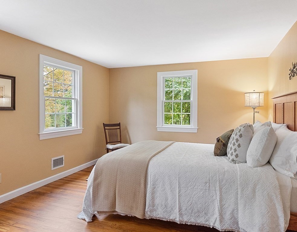 830 Liberty Square Road Boxborough, MA 01719 - Photo 20 of 40 a bedroom with a bed and a window