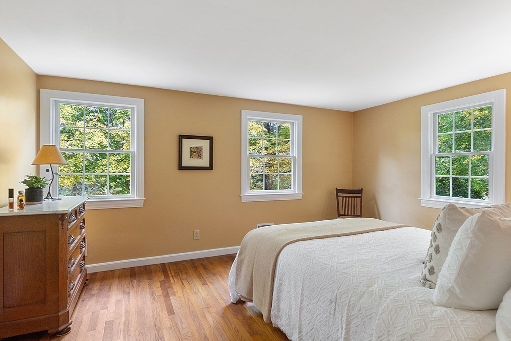 830 Liberty Square Road Boxborough, MA 01719 - Photo 21 of 40 a bedroom with a bed and a window