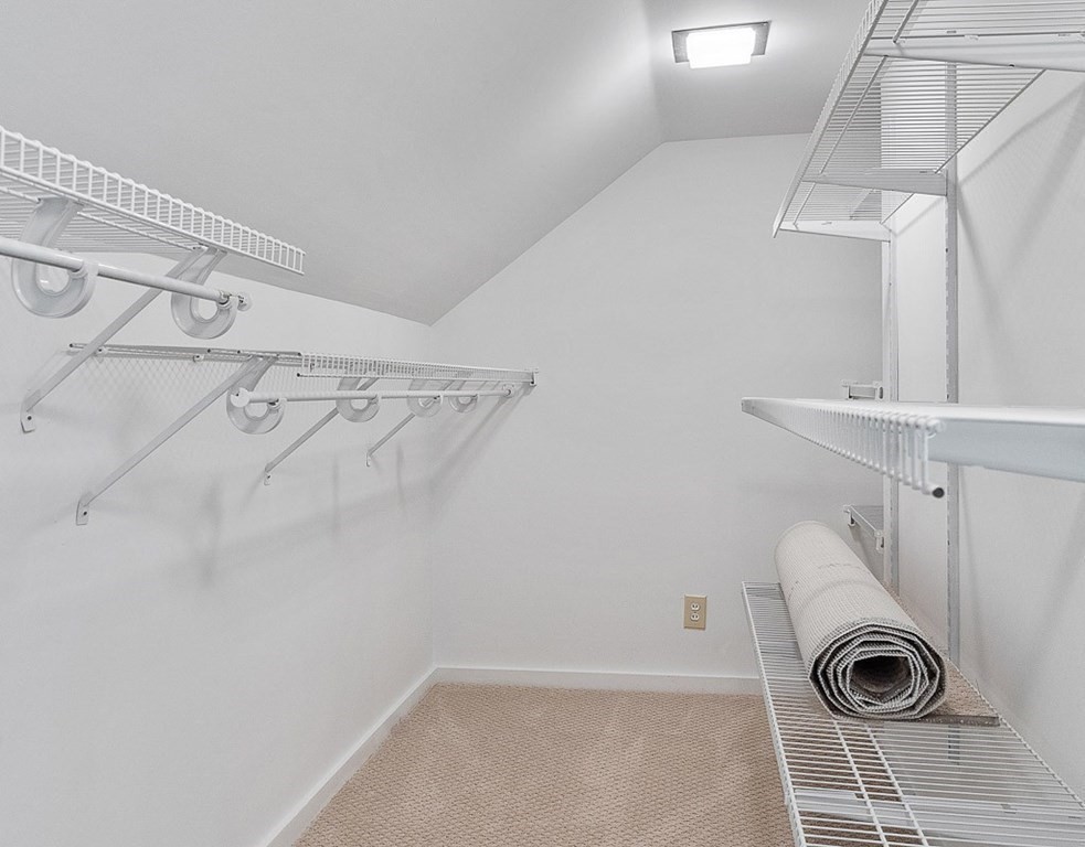 830 Liberty Square Road Boxborough, MA 01719 - Photo 29 of 40 a view of walk in closet with empty racks