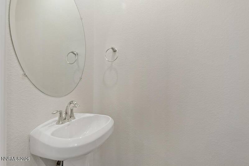 285 Mark Jeffrey Lane Reno, NV 89503 - Photo 9 of 20 a bathroom with a sink and a mirror