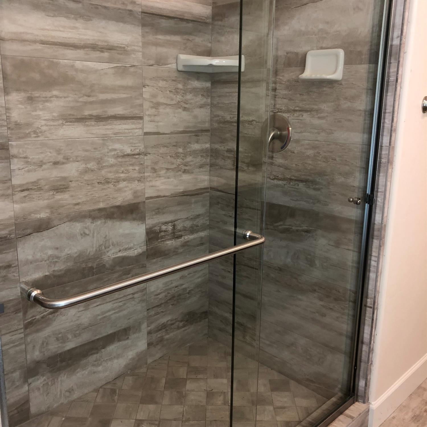 159 North Belmont Road Exeter, CA 93221 - Photo 25 of 28 a bathroom with a bath tub