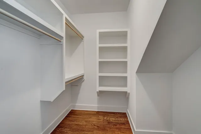 a view of an empty walk in closet