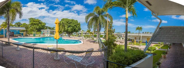 an ocean view with outdoor seating