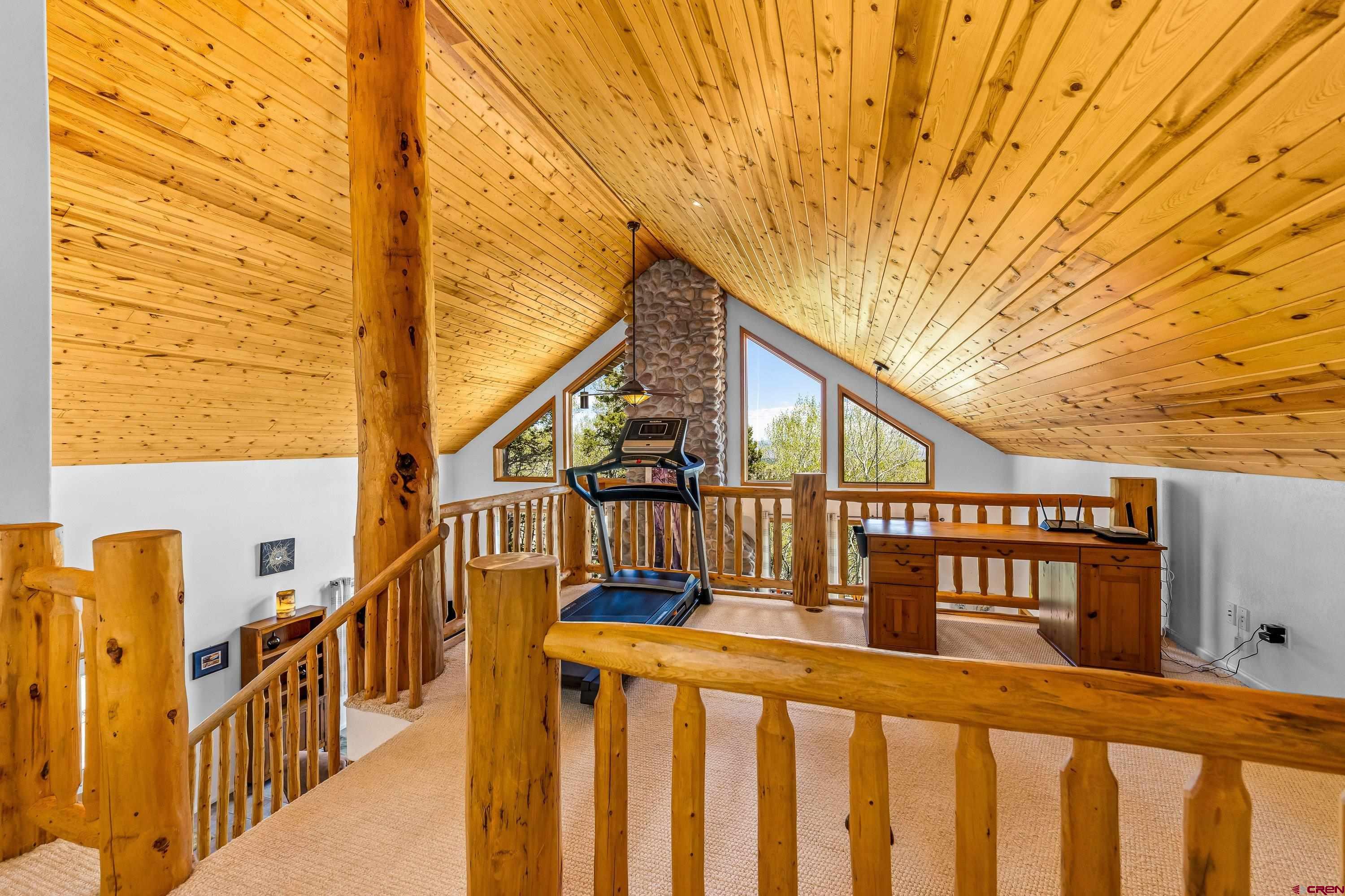 180 Ridge Road Cimarron, CO 81220 - Photo 23 of 42 a view of wooden house with a street