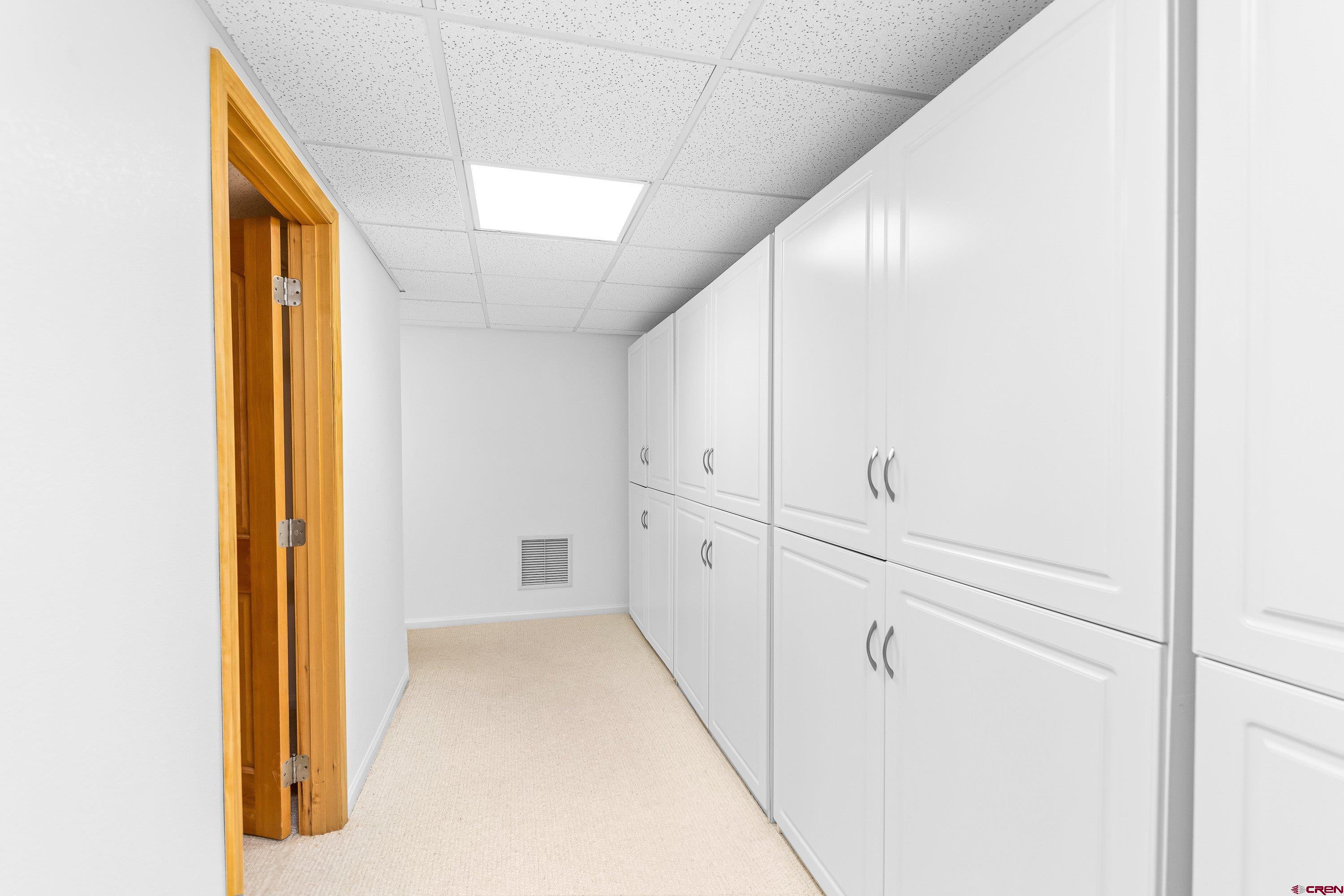 180 Ridge Road Cimarron, CO 81220 - Photo 28 of 42 a view of a hallway with closet