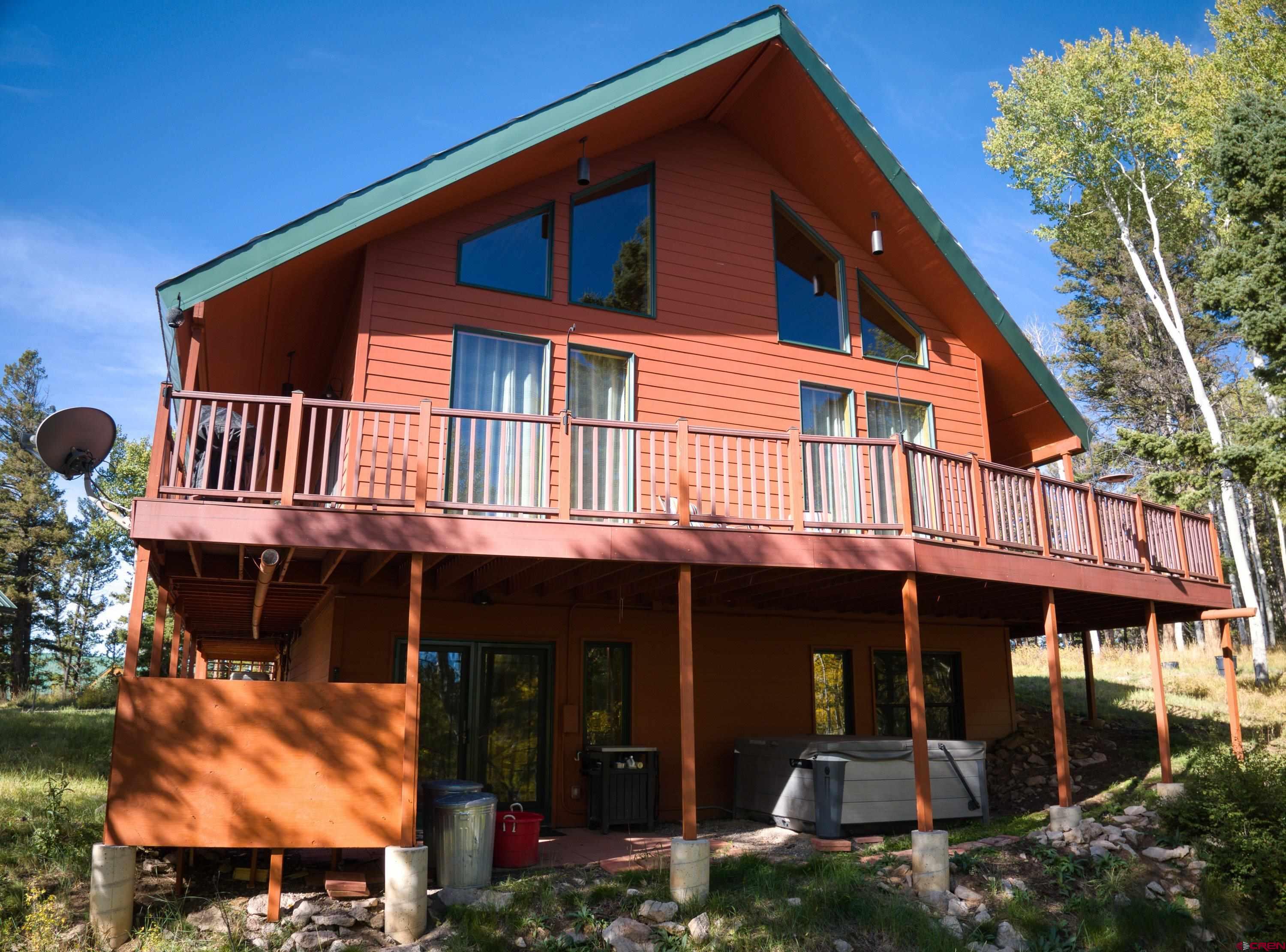 180 Ridge Road Cimarron, CO 81220 - Photo 5 of 42 a front view of a house
