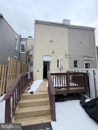 a view of balcony with furniture