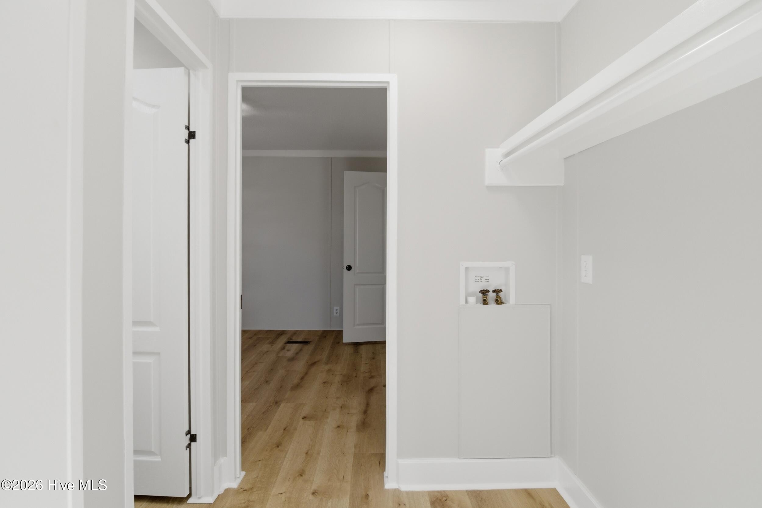 109 Quail Point Drive Hubert, NC 28539 - Photo 13 of 29 13_laundry hallway