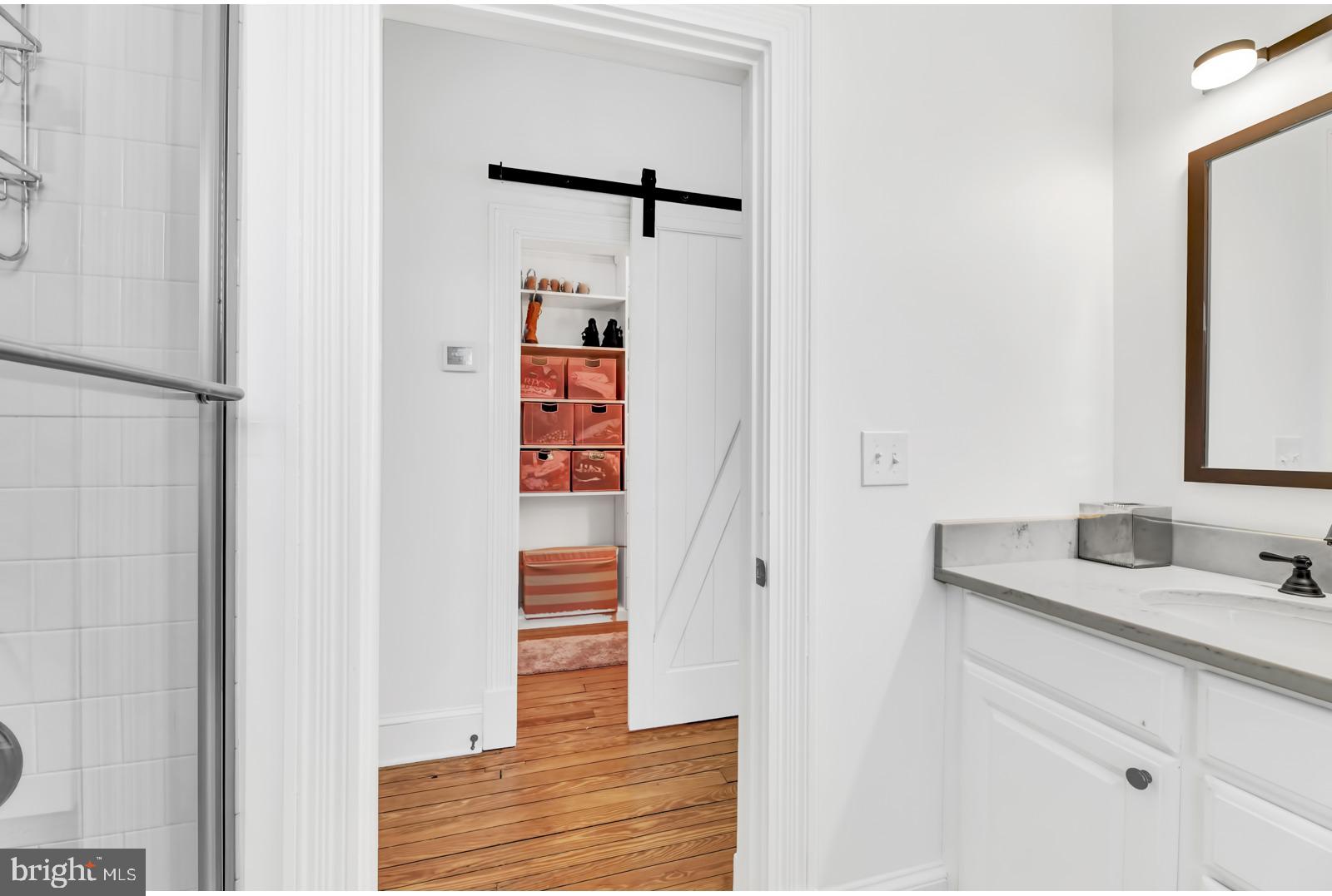 4906 Roland Avenue Baltimore, MD 21210 - Photo 33 of 52 BEDROOM SUITE BATH & WALK IN CLOSET WITH BARN DOOR
