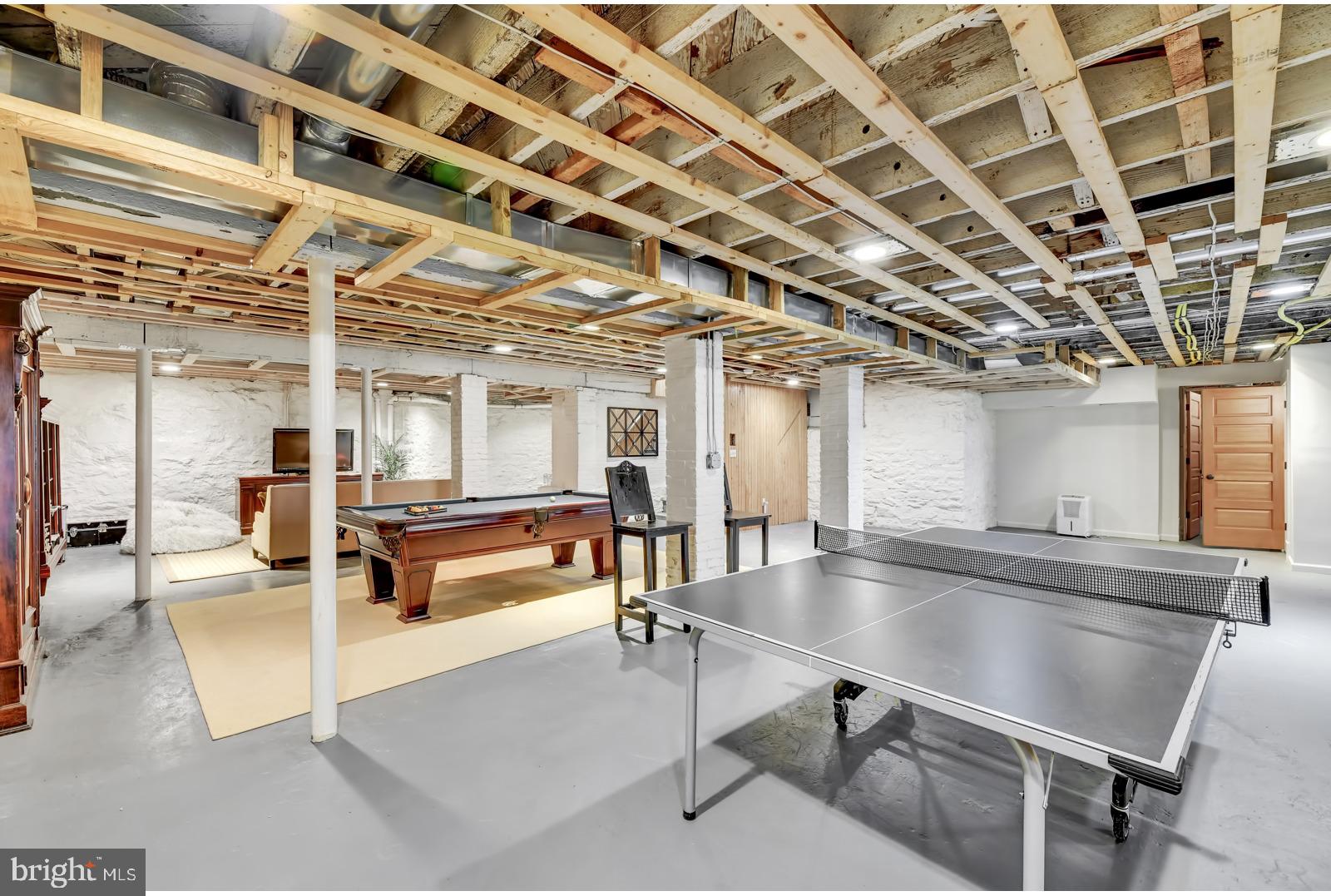 4906 Roland Avenue Baltimore, MD 21210 - Photo 40 of 52 LOWER LEVEL MODERN/INDUSTRIAL REC ROOM