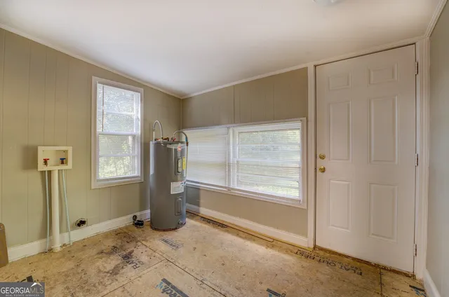 a view of an empty room and window