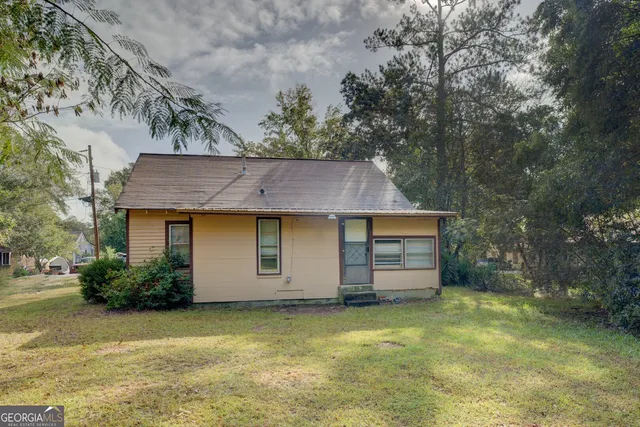 a house view with a garden space