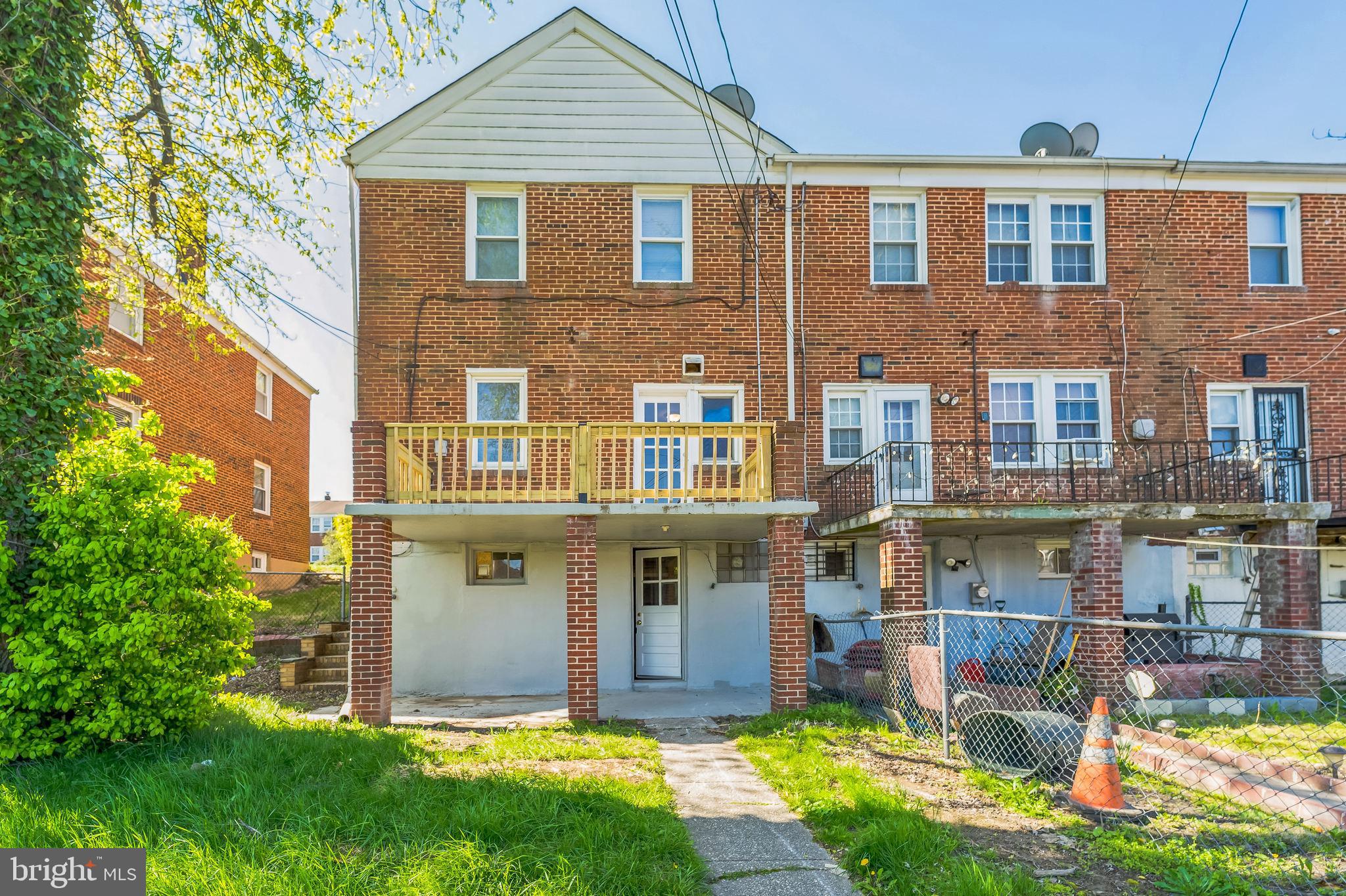 1646 Northwick Road Baltimore, MD 21218 - Photo 3 of 16 Rear view - deck off the kitchen & walkout patio