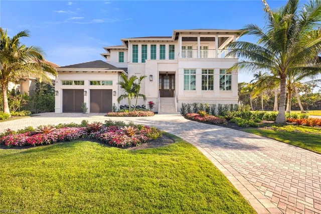 a front view of building with yard