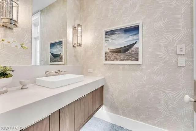 a view of a workspace with furniture and wooden floor