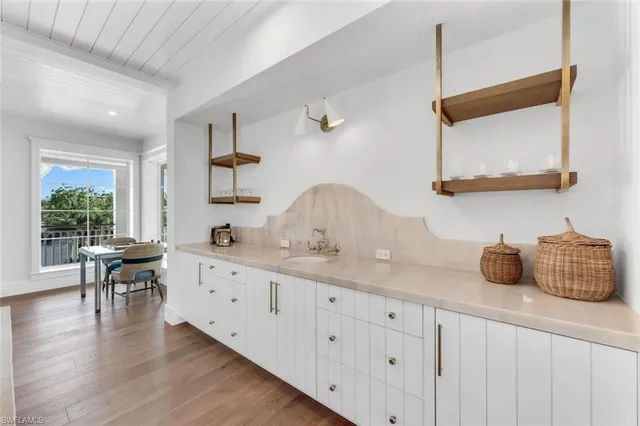 a bathroom with a double vanity sink mirror and double
