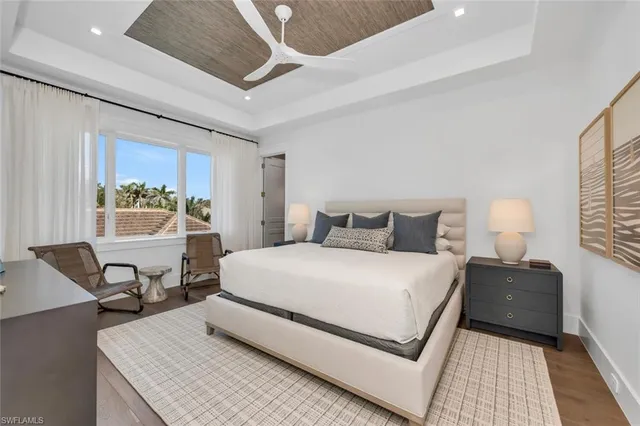 a view of a backyard with sitting area