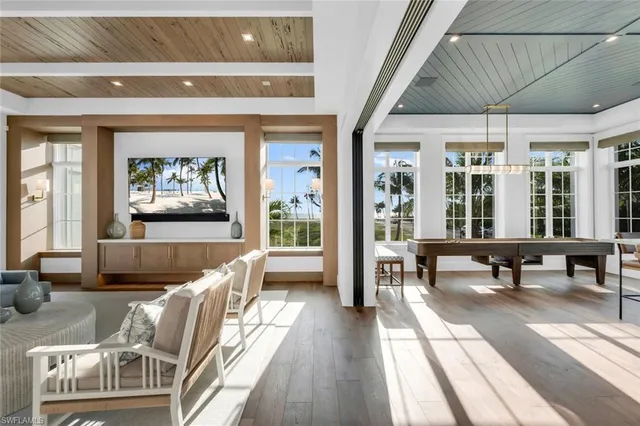 a view of a balcony with table and chairs
