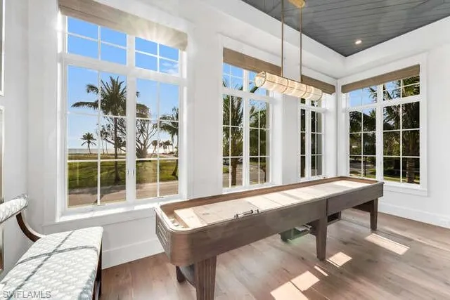 a kitchen with stainless steel appliances granite countertop a sink counter space cabinets and a stove